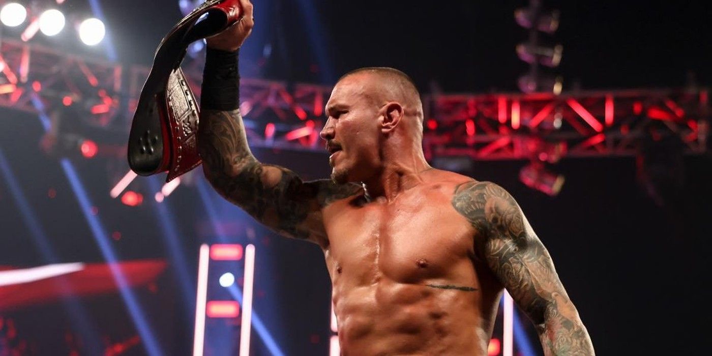 randy orton holding a title