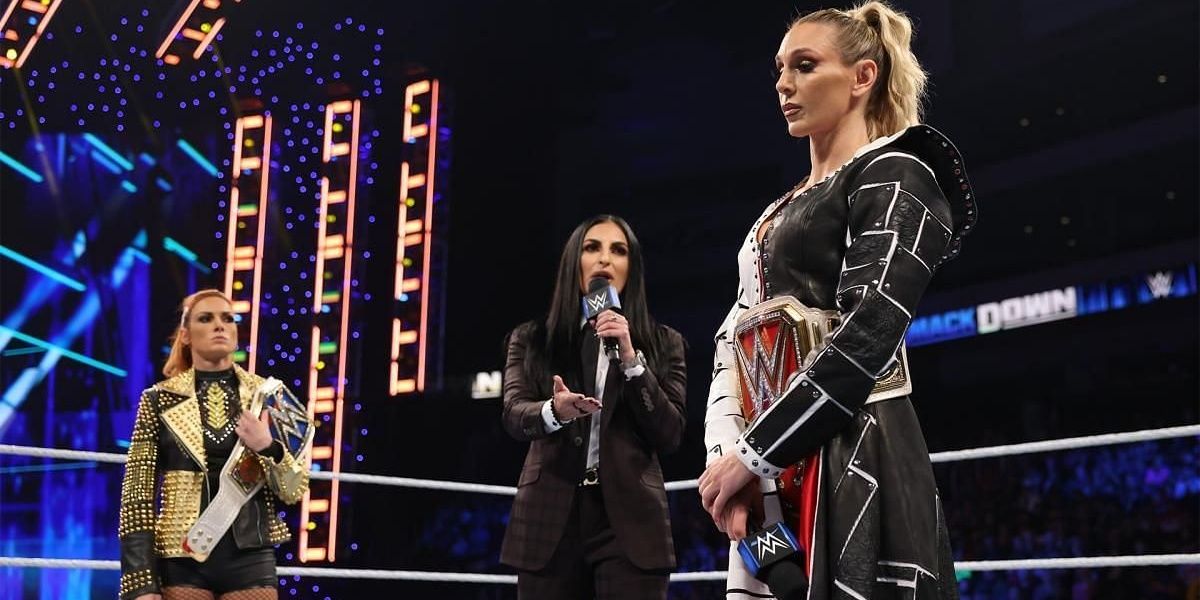 Charlotte Flair and Becky Lynch trade titles Cropped