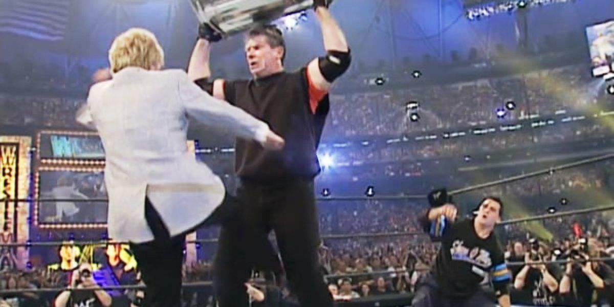 Linda McMahon attacking Vince while Shane watches