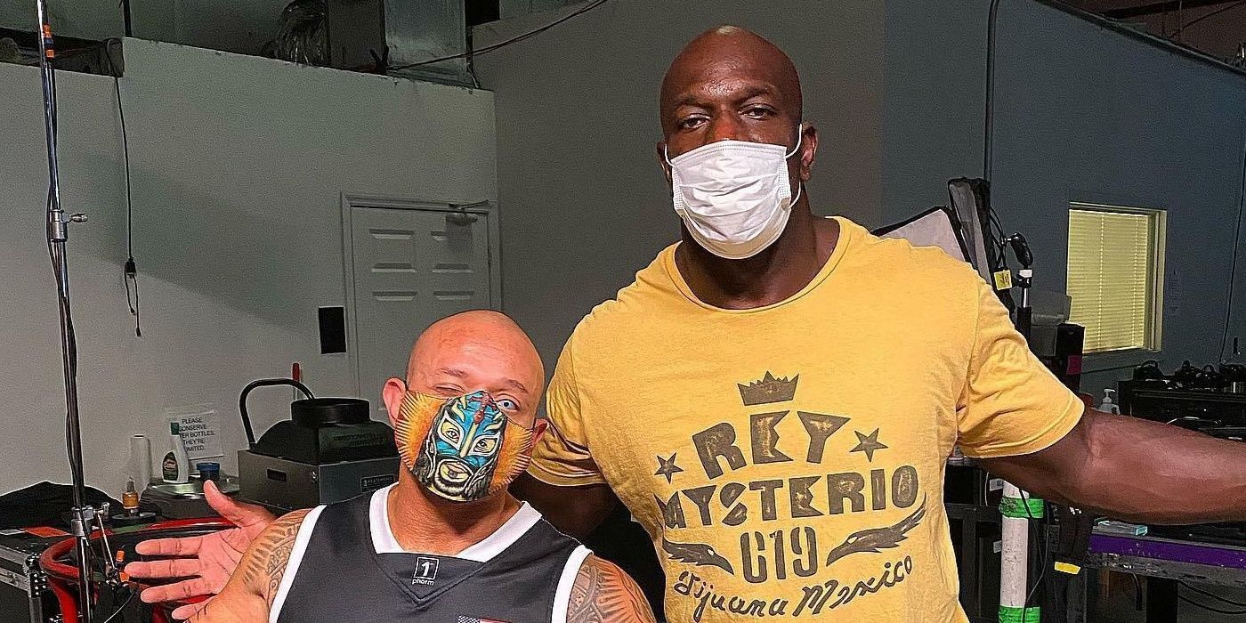 Rey Mysterio and Titus O'Neil COVID masks