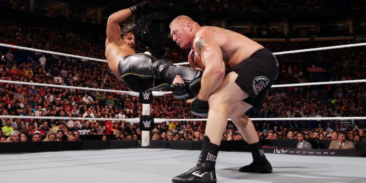 Brock Lesnar catches Seth Rollins' legs