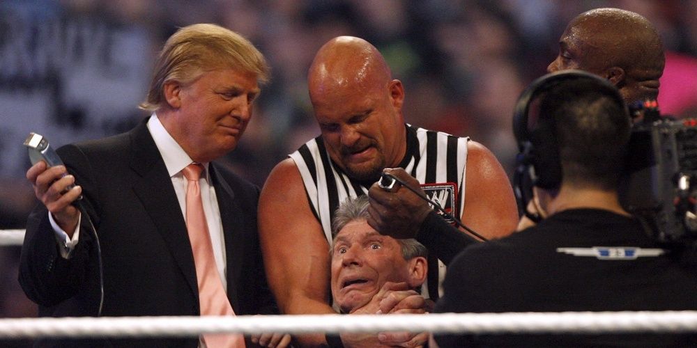Steve Austin helping Donald Trump shave Vince McMahon's hair