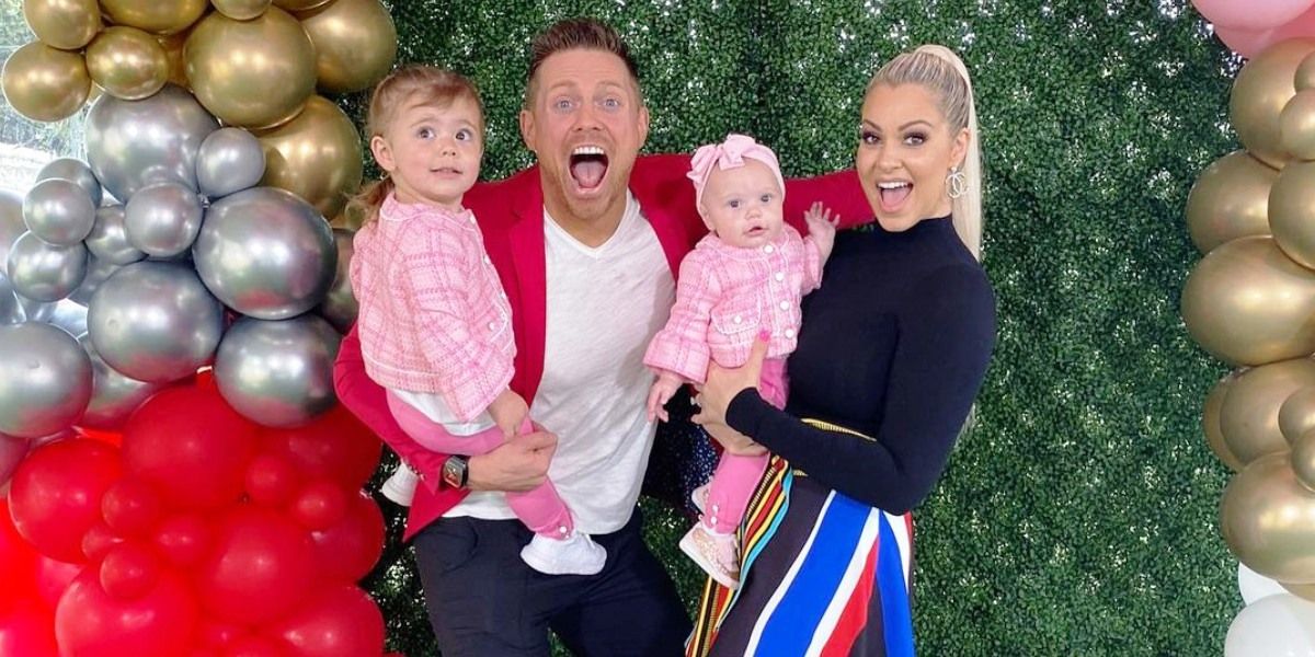 The Miz and Maryse with their children