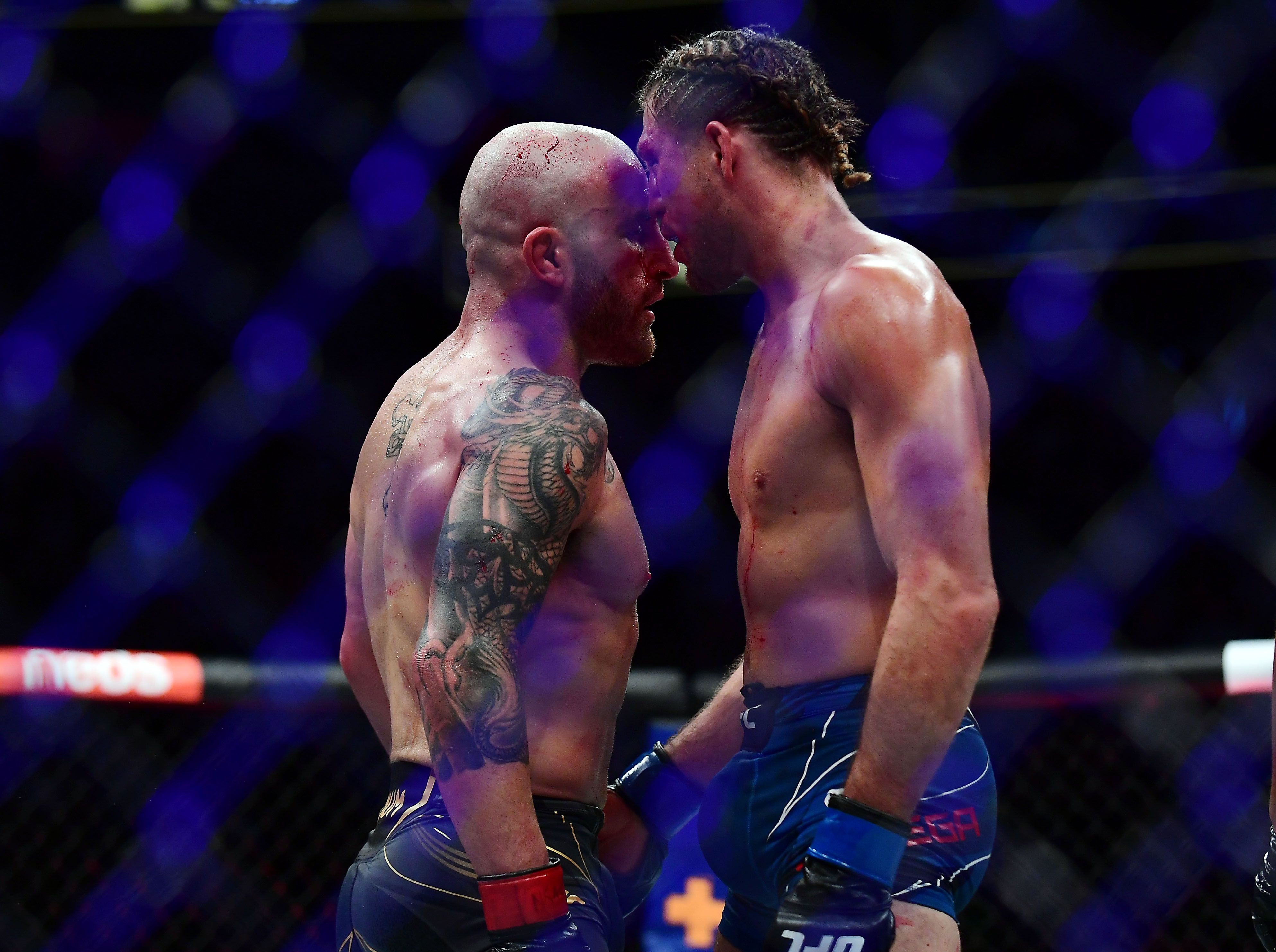 Volkanovski and Ortega showing respect after their incredible UFC 266 title fight.