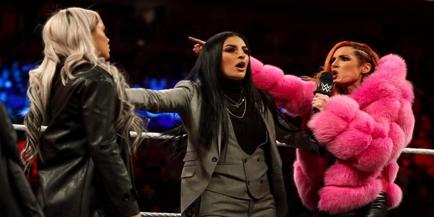 Sonya Deville separates the arguing wrestlers