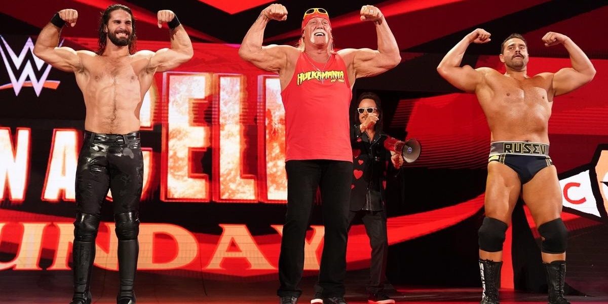 Hulk Hogan flexes with Seth Rollins and Rusev Cropped