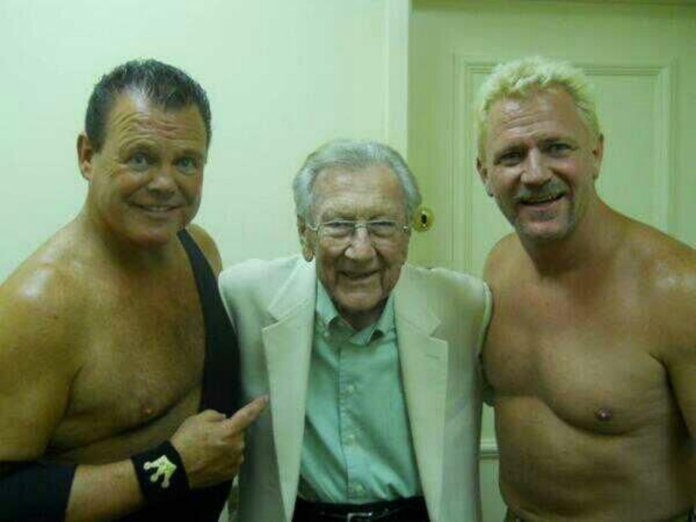 Jeff Jarrett and his father, Jerry Jarrett, with Jerry "The King" Lawler