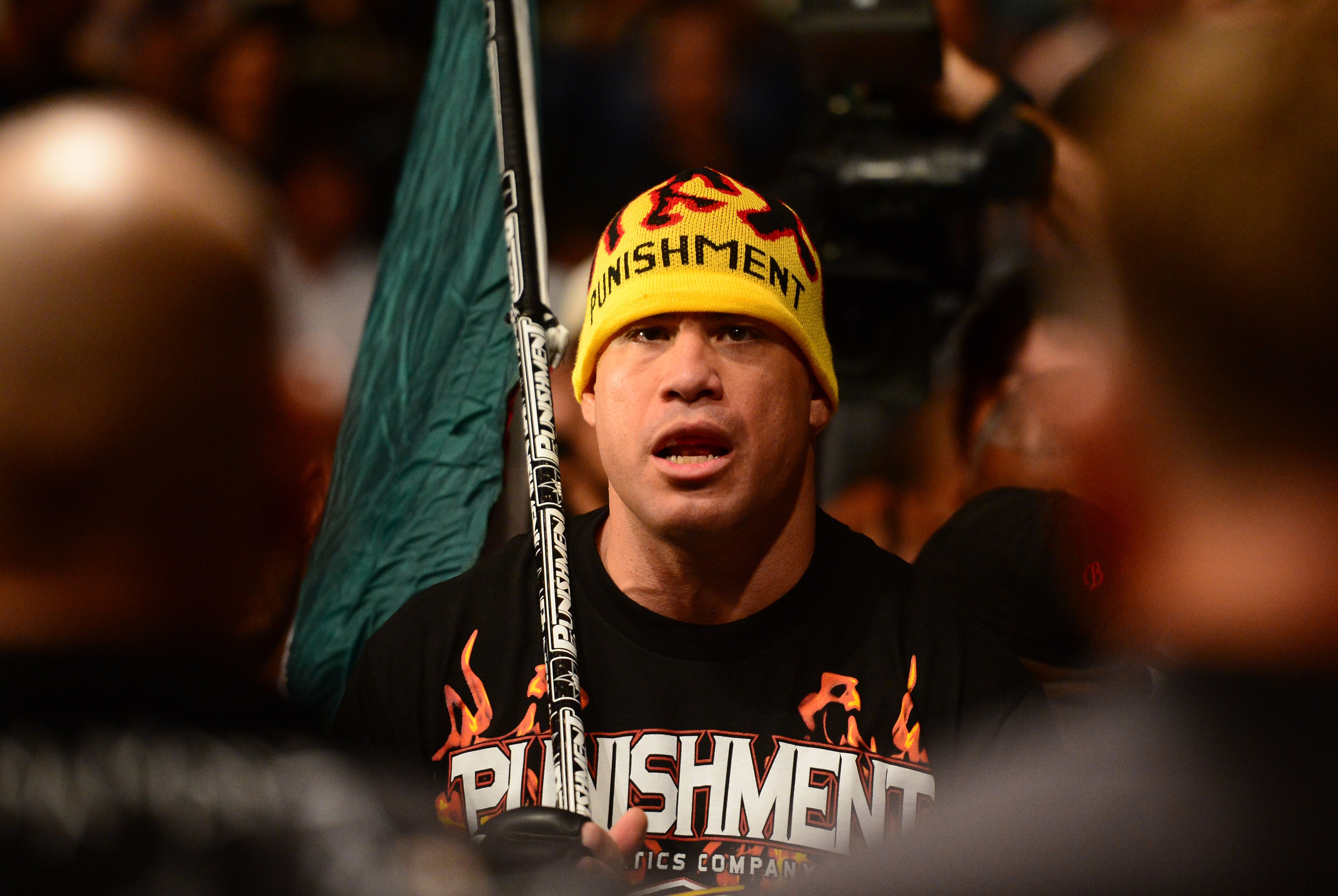 tito-ortiz-with-flag-and-beanie-in-walk-out