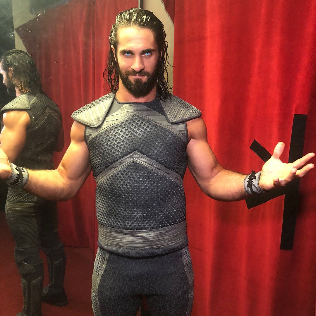 Seth Rollins poses backstage