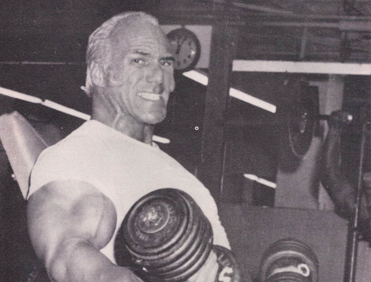 Superstar Billy Graham lifting weights