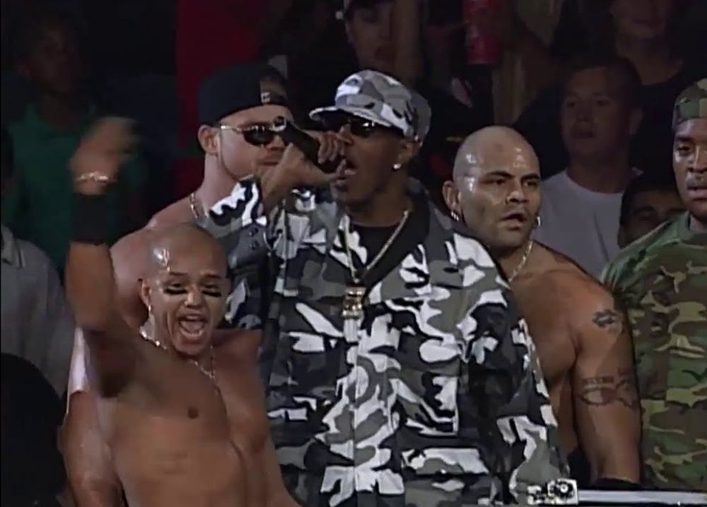 Rey Mysterio with the No Limit Soldiers