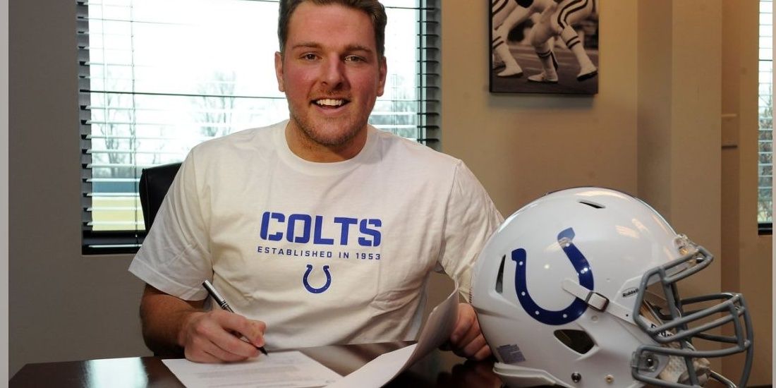 Pat McAfee signing his contract 