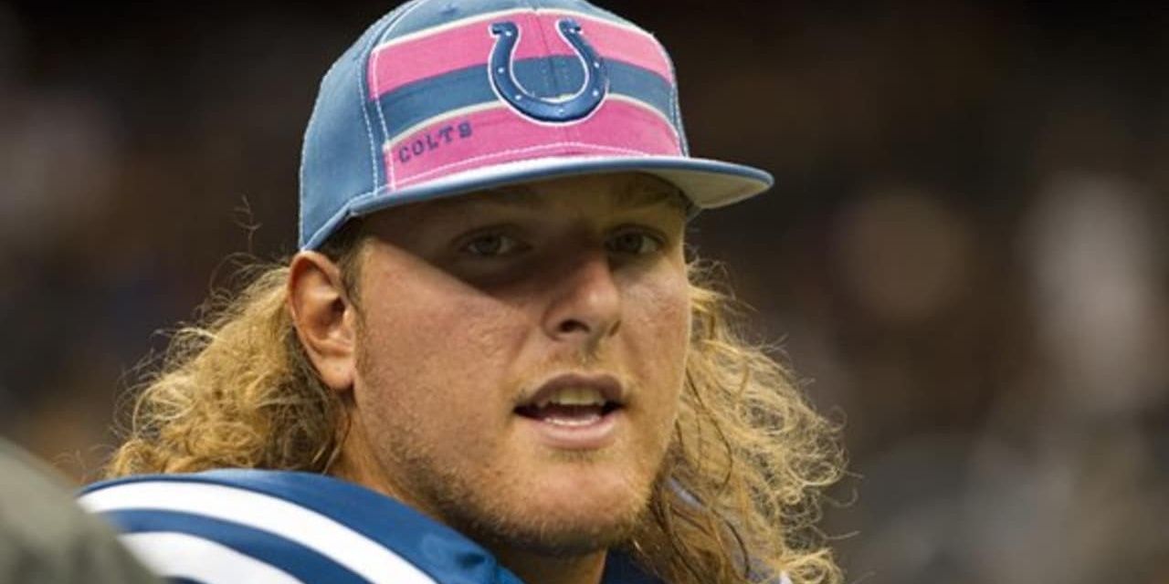 Pat McAfee with long hair 