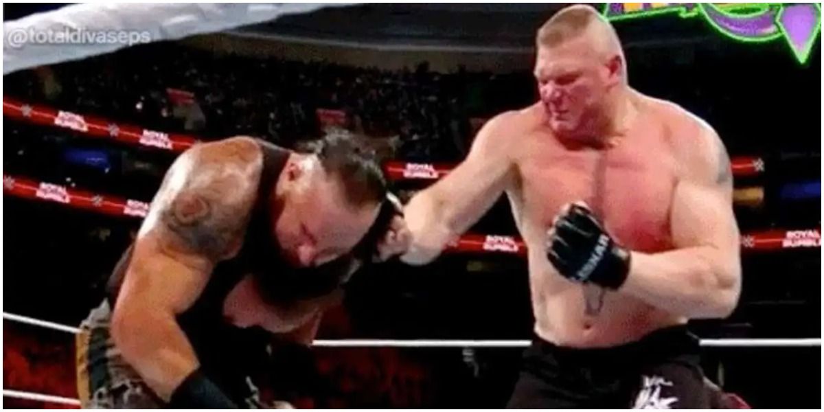 Brock Lesnar punches Braun Strowman