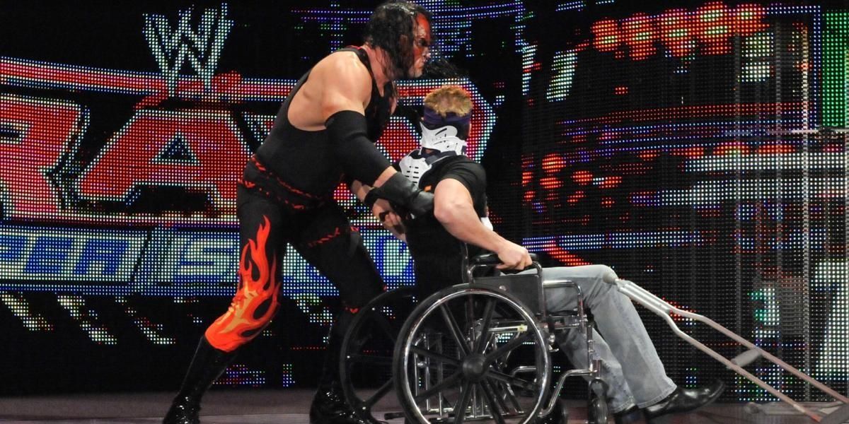 Kane pushes Zack Ryder in a wheelchair 