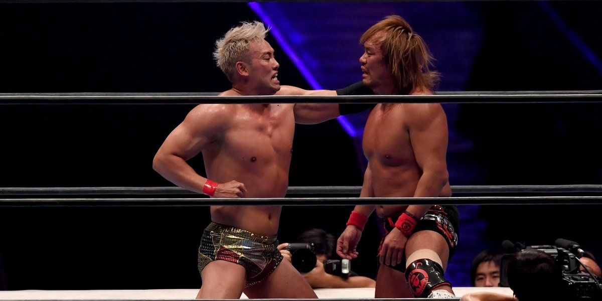 Kazuchika okada and Tetsuya Naito trade forearms in their IWGP Heavyweight Championship & IWGP Intercontinental Championship match NJPW WrestleKingdom 14 Night Two