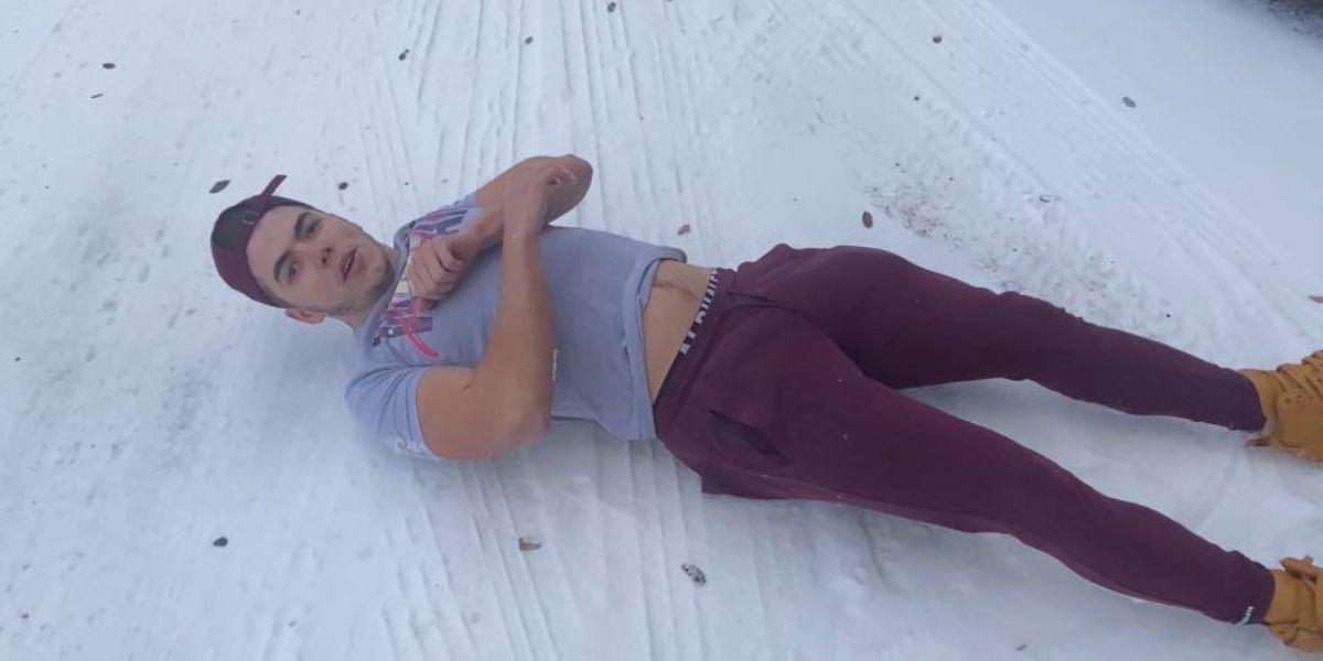 Sammy GUevara laying in the snow