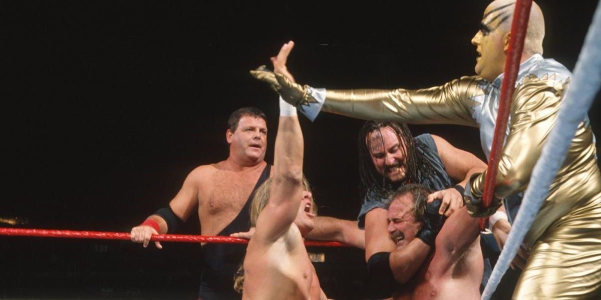 Triple H, Jerry Lawler, Crush & Goldust v Jake Roberts, Rocky Maivia, The Stalker and Marc Mero Survivor Series 1996 Cropped