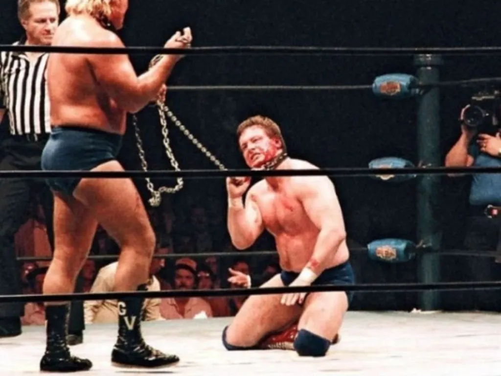 Roddy Piper during his infamous Dog Collar Match against Greg the Hammer Valentine