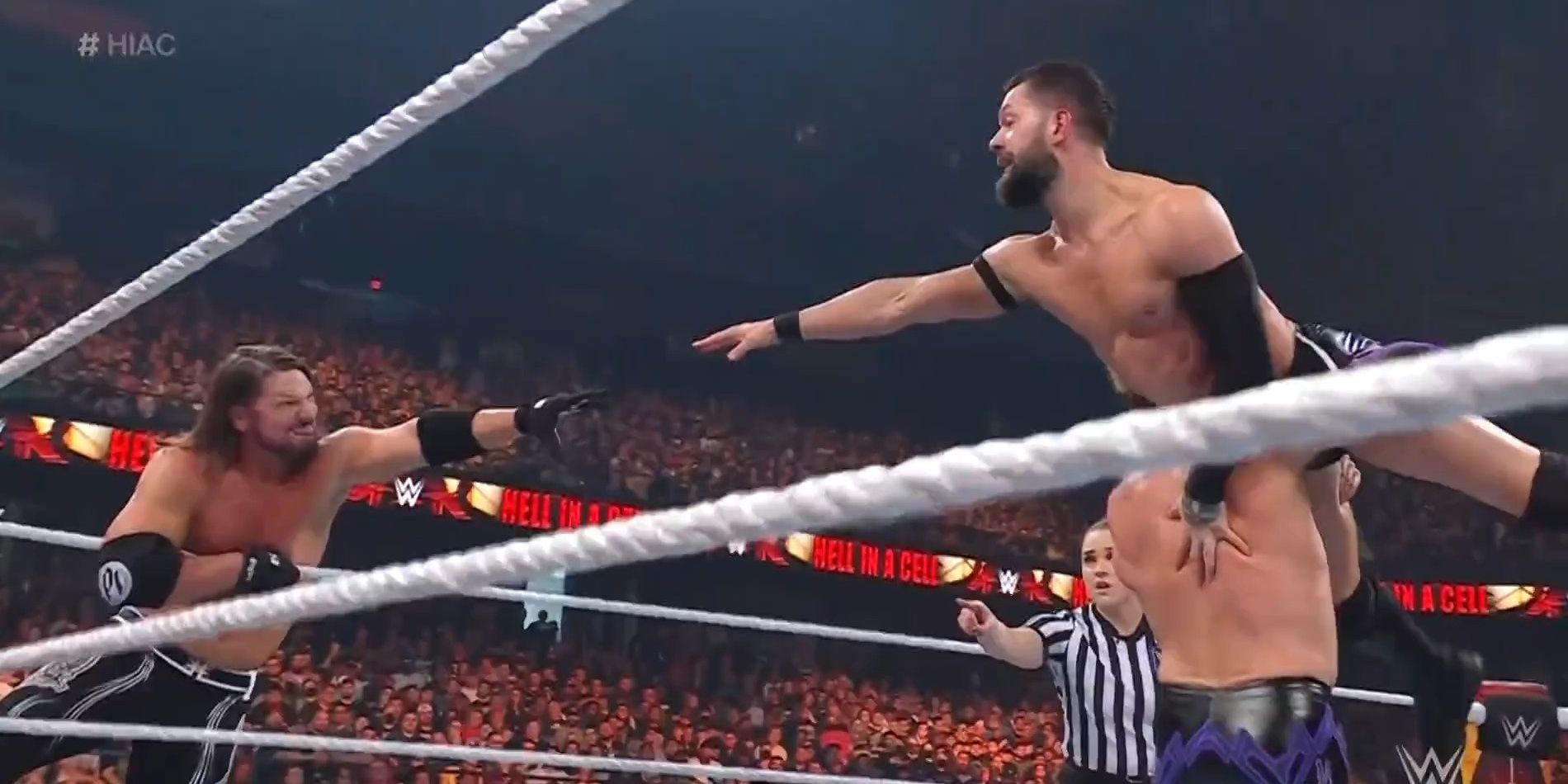 Finn Balor tries to tag AJ Styles Cropped