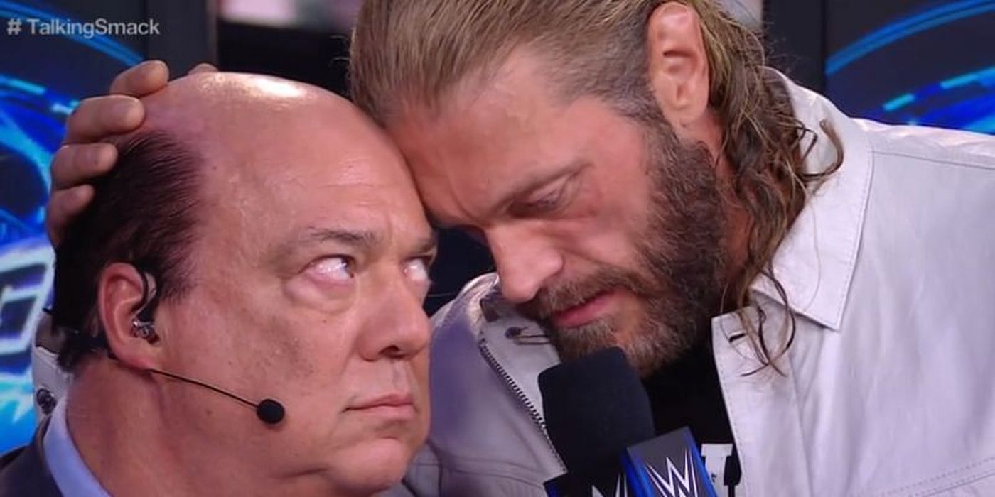 Paul Heyman y Edge hablando de bofetada