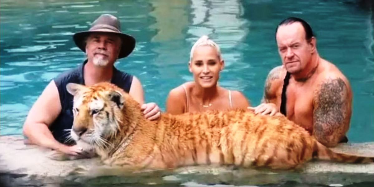 The Undertaker and Michelle McCool with a tiger