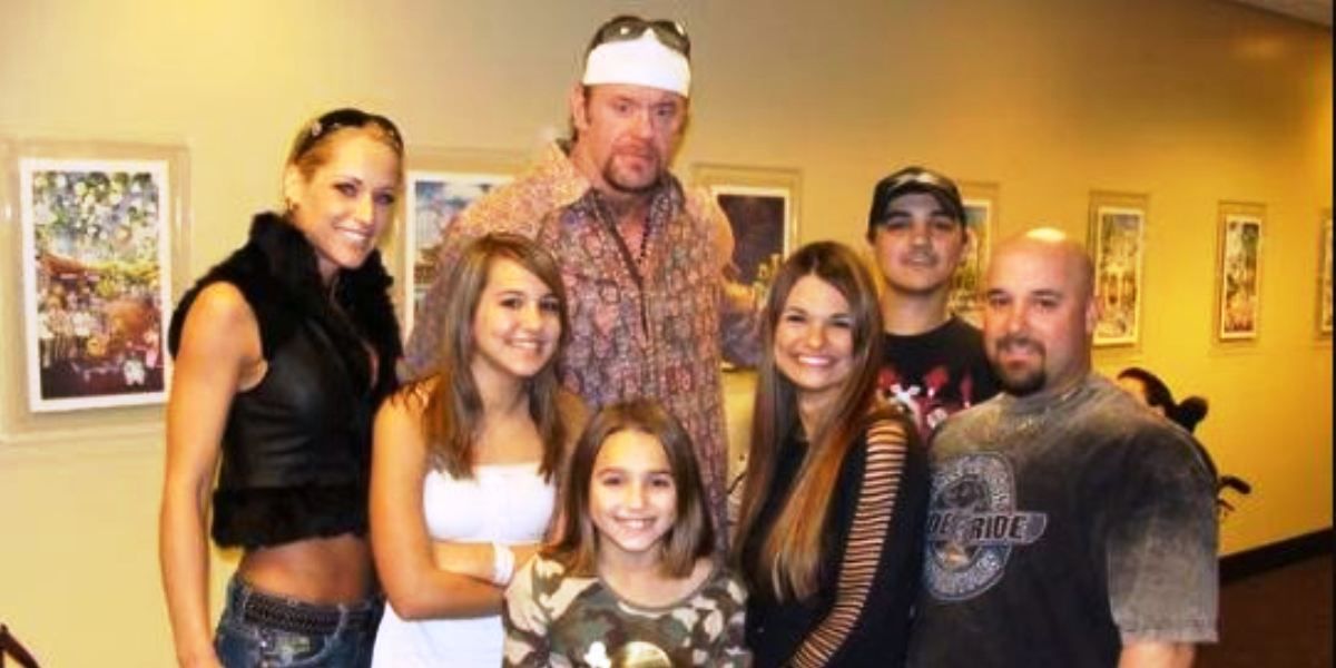 The Undertaker and Michelle McCool with fans