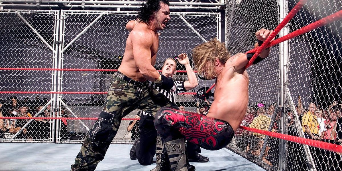 Matt Hardy wrestling Edge inside a steel cage 