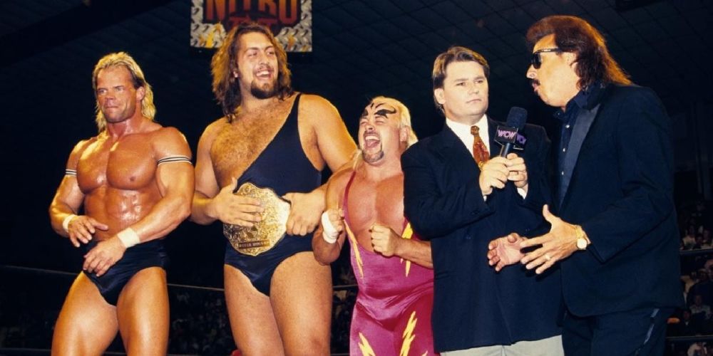 Lex Luger, World Champion the Giant, Kevin "Taskmaster" Sullivan and Jimmy Hart of the Dungeon of Doom give Tony Schiavone an interview in WCW