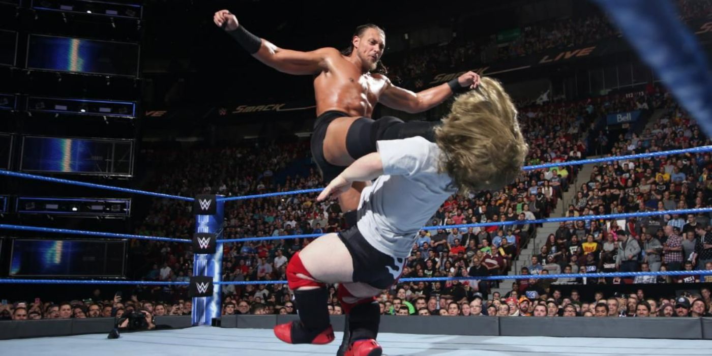 Big Cass attacking Daniel Bryan impersonator