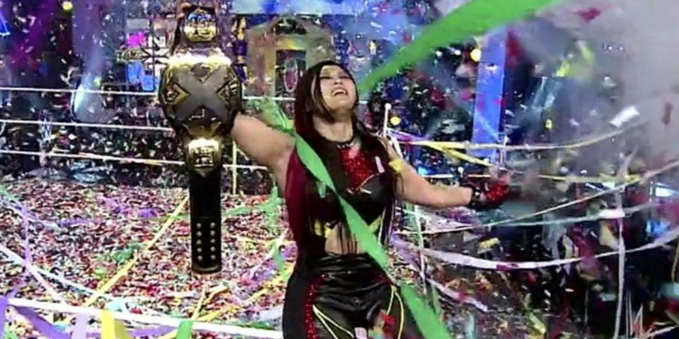 Io Shirai celebrating as NXT Women's Champion