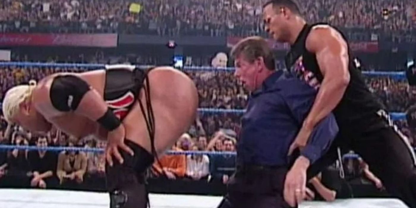 The Rock setting up Vince McMahon for a stinkface