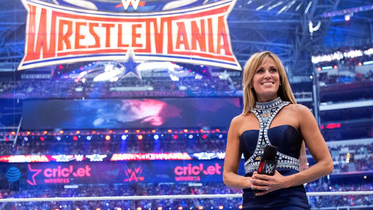 Lilian Garcia in front of the WrestleMania sign