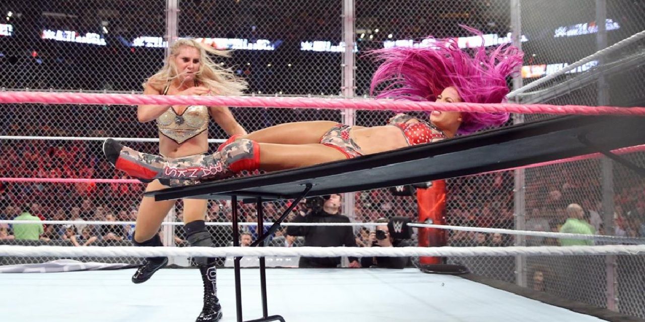 Charlotte Flair and Sasha Banks Hell in a Cell table bump