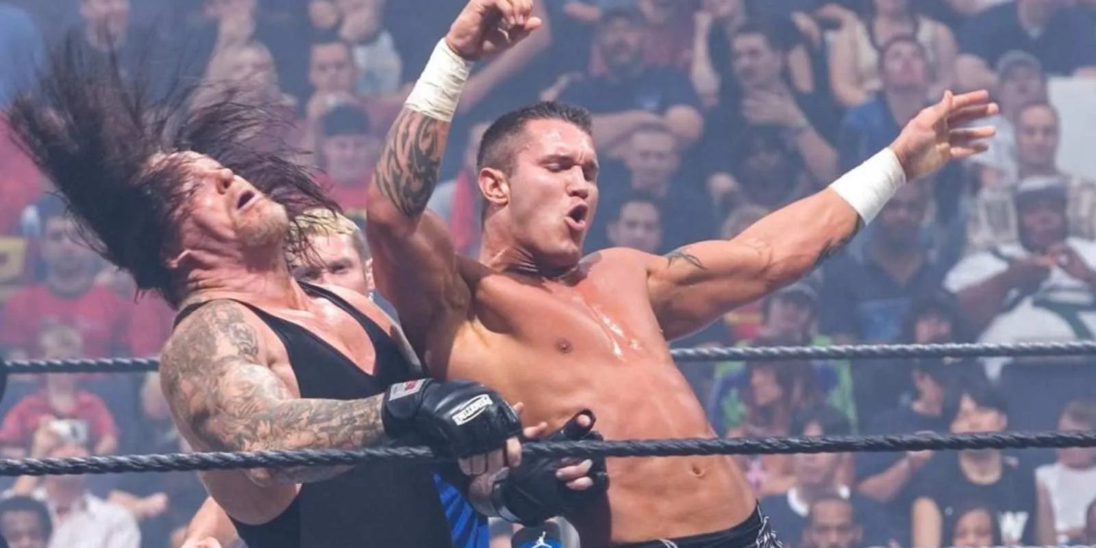 Randy Orton fighting Undertaker 