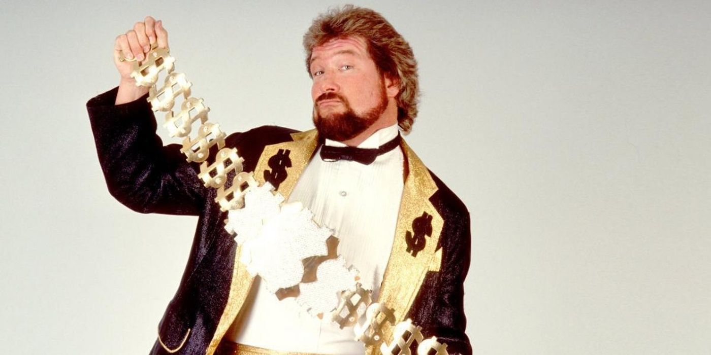 The Million Dollar Man, Ted DiBiase, posing with the Million Dollar Championship.