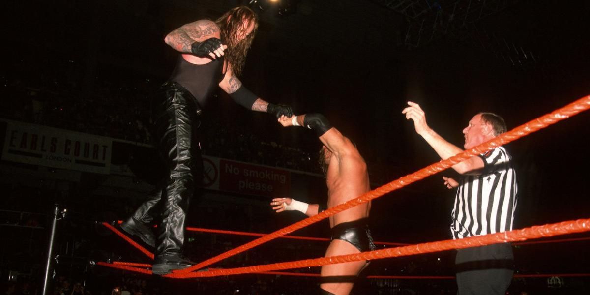 Undertaker Triple H Insurrextion 2002