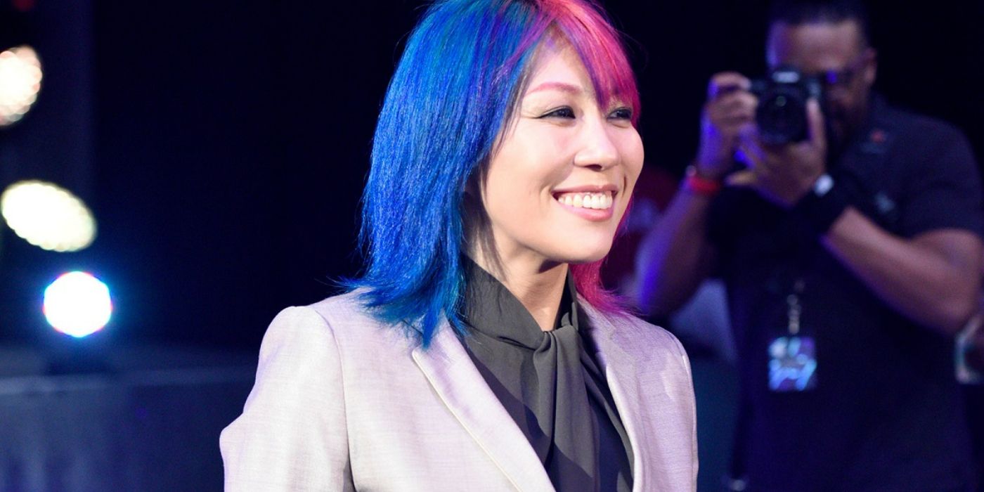 WWE Asuka wearing a suit