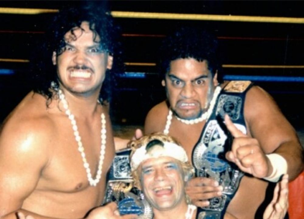 The Samoan Swat Team as WCCW Tag Team Champions wiht Buddy Roberts