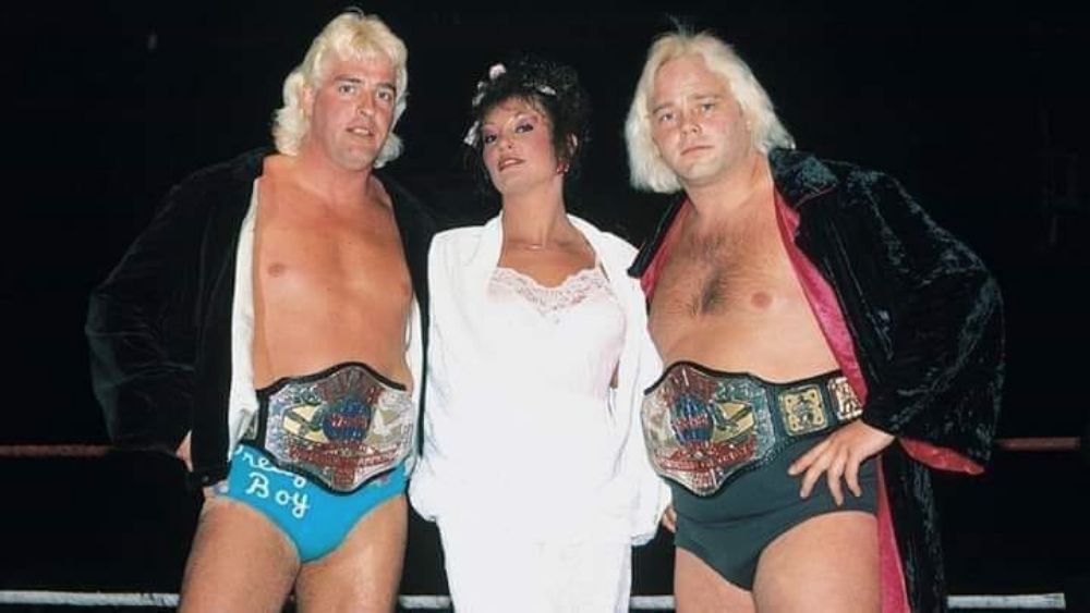 AWA Tag Team Champions Doug Somers and Playboy Buddy Rose with Sherri Martel