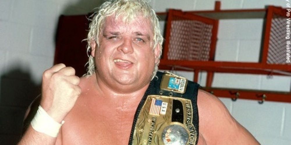 Dusty Rhodes with the NWA World Heavyweight Championship. 