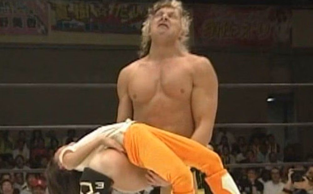 The Story Behind Kenny Omega Wrestling A Blow Up Doll Explained