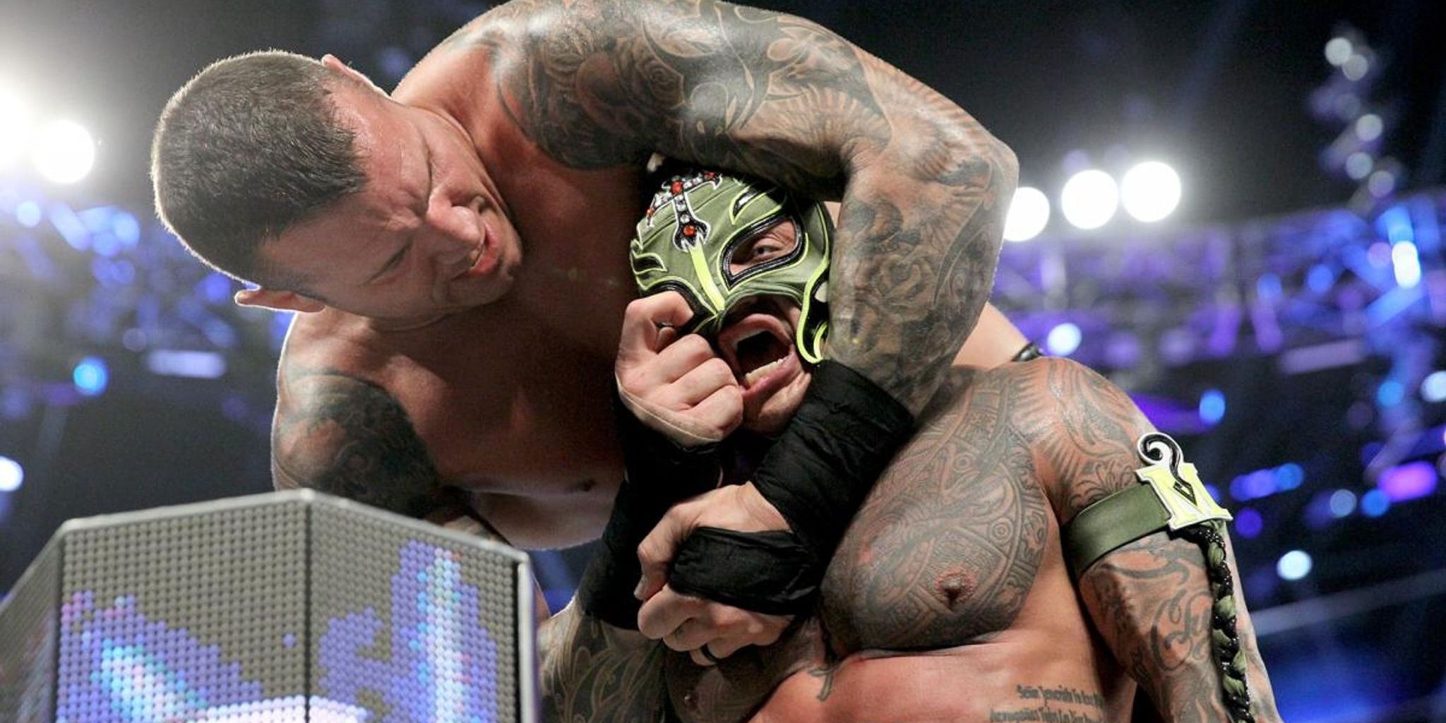 Randy Orton takes Rey Mysterio's mask 