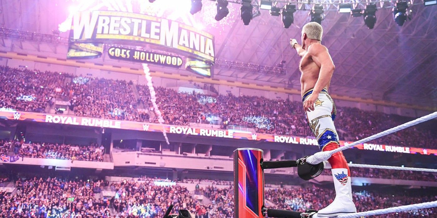 cody rhodes pointing at the wrestlemania sign