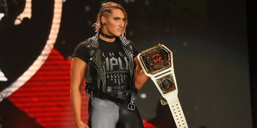 A Clear Rhea Ripley Backpack 10 Best Looks Of Rhea Ripley's WWE Career, Ranked