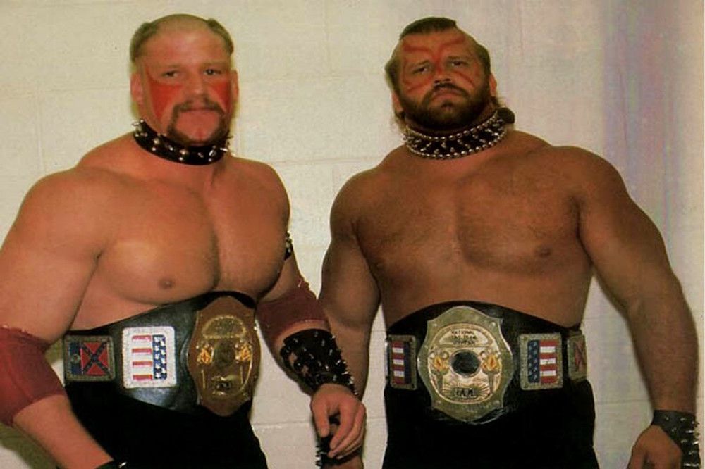The Road Warriors with the NWA National Tag Team Championship