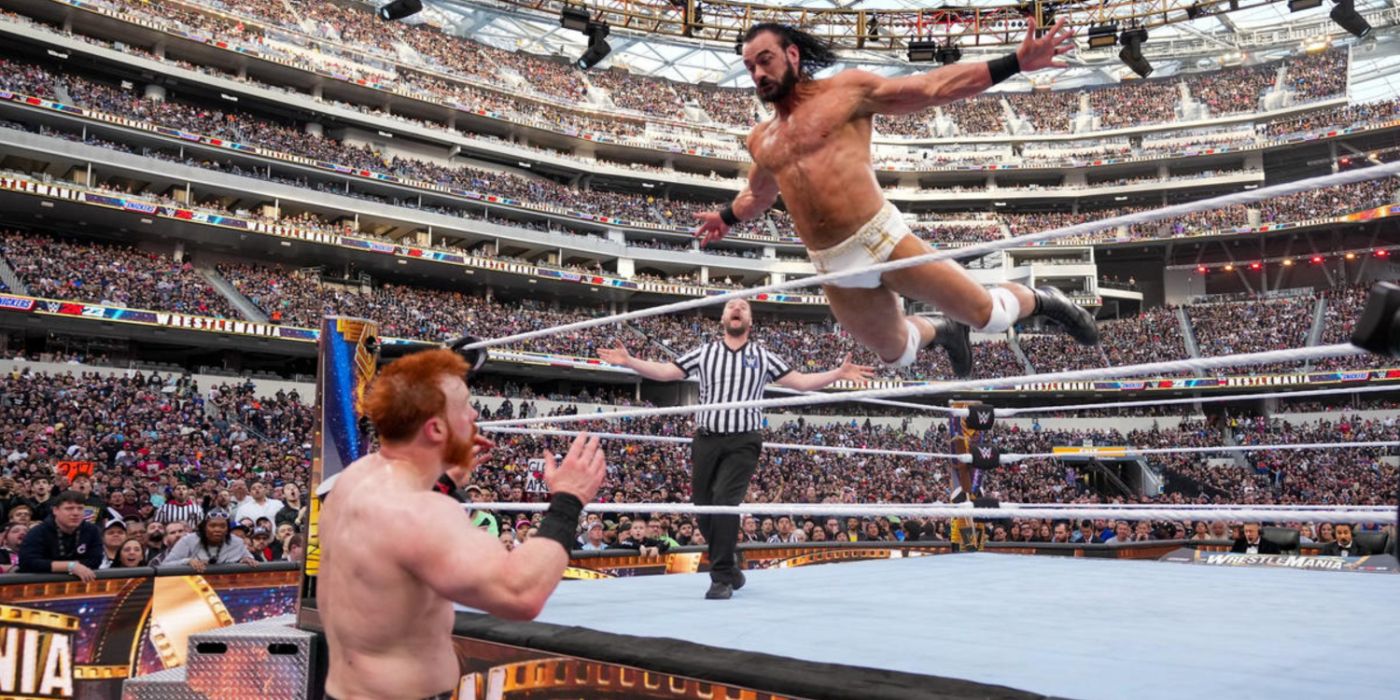 drew mcintyre diving out of the ring onto sheamus