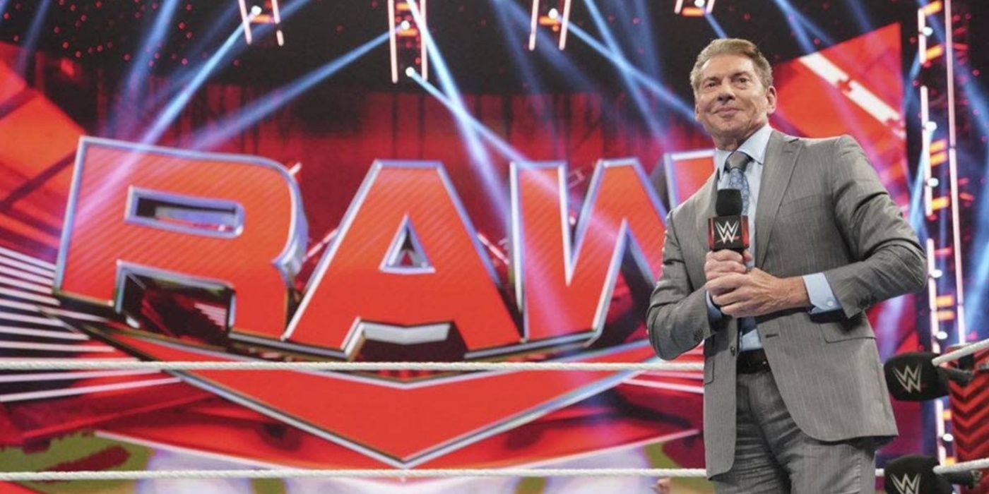 vince mcmahon standing in the ring on raw