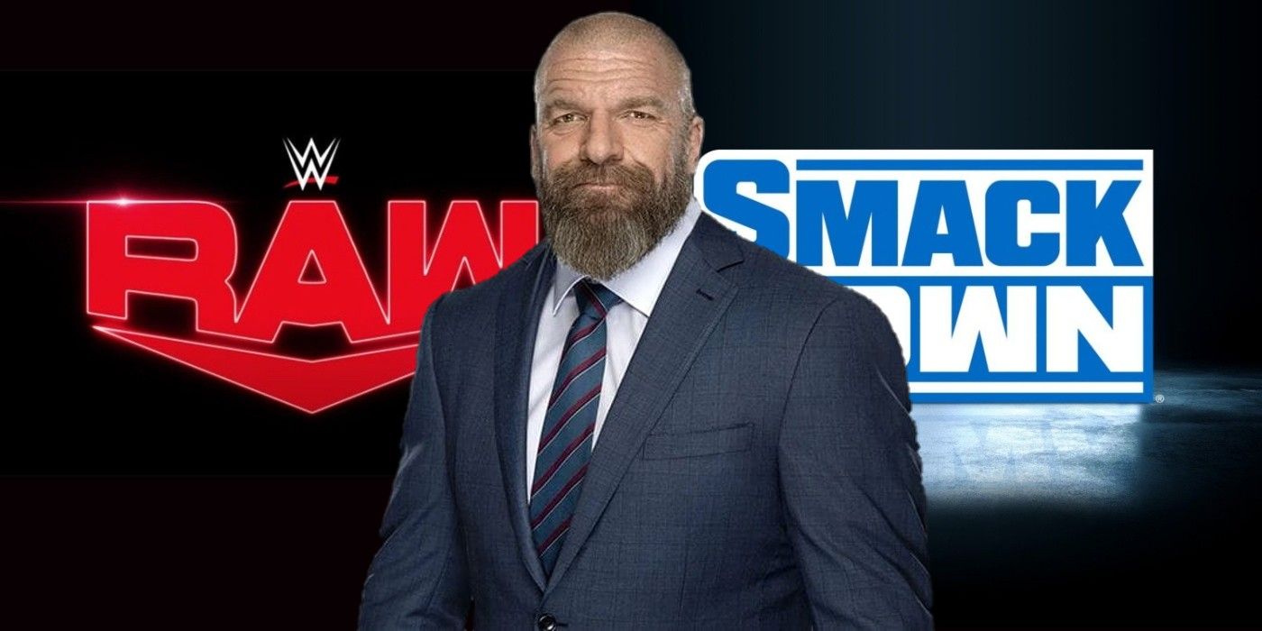 triple h standing between the raw and smackdown logos