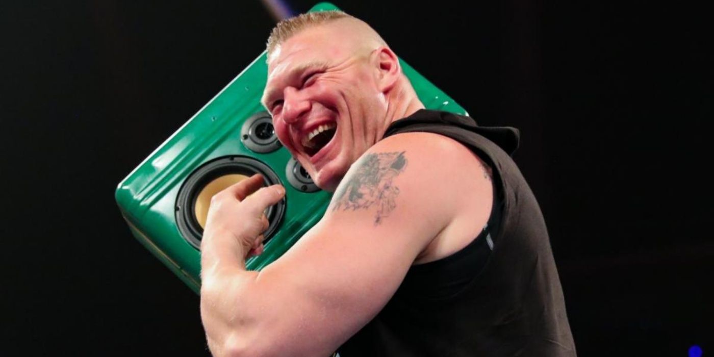 brock lesnar pretending his money in the bank briefcase is a boombox